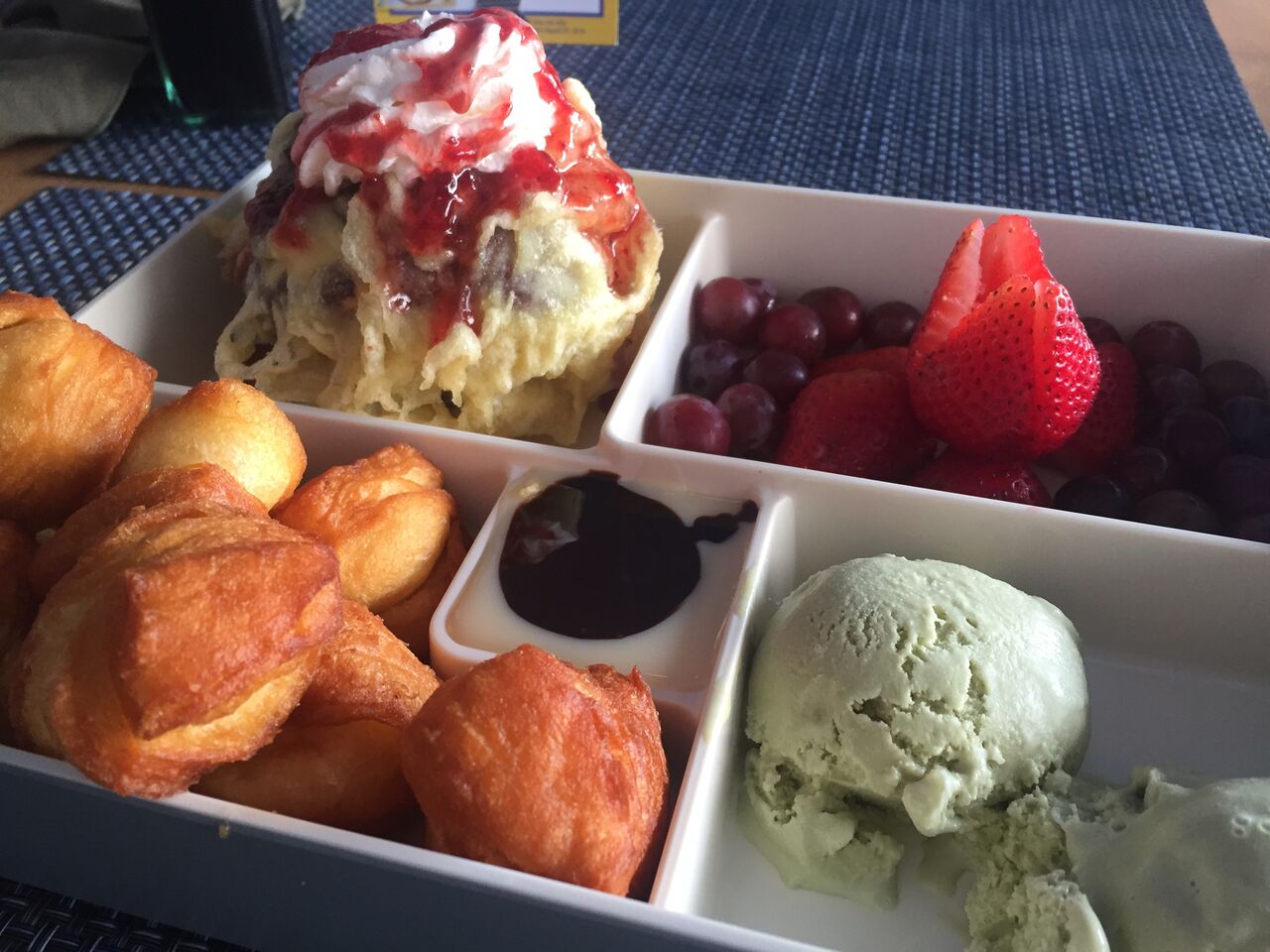 Dessert Bento, with thai donuts, green tea icing, red velvet cake and ice cream tempura, and fruit from Sushi Maki in Coral Gables! Click to read more or Pin and save for later.