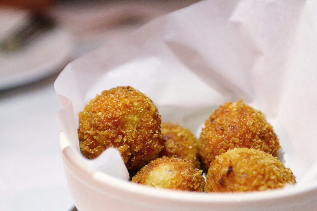 Taberna Giralda is the best Spanish restaurant in Coral Gables and serves delicious Serrano ham croquetas.